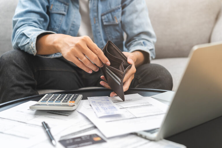 Debt financial concept, stressed problem people asian man, male hand open empty wallet not have budget of money to pay no have credit card, not able payment bill, loan or expense with bank, bankruptcy